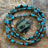 The Woods: rhyolite and apatite amulet