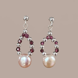 pink pearl dots on a small oval hoop with garnet and silver beads on silver ball and post earrings