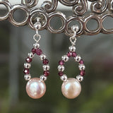 pink pearl dots on a small oval hoop with garnet and silver beads on silver ball and post earrings
